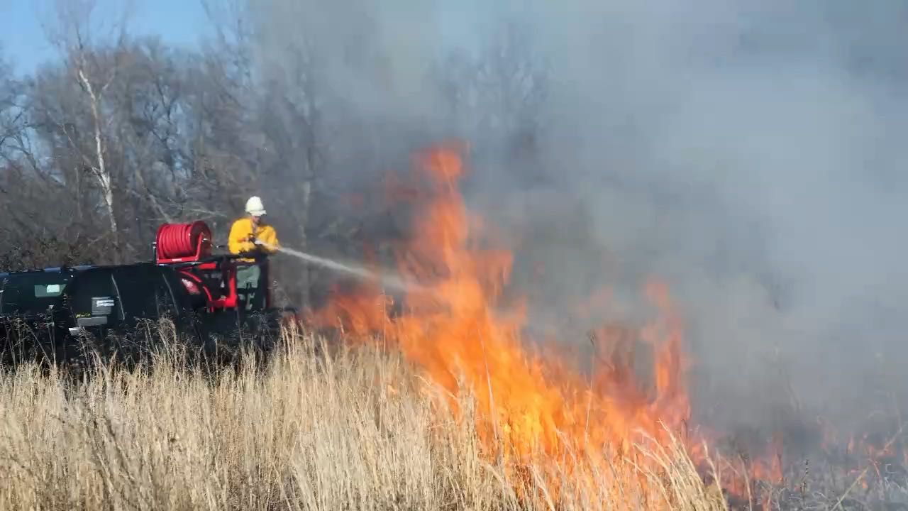 Minute Manufacturing fire skids fighting a grass fire